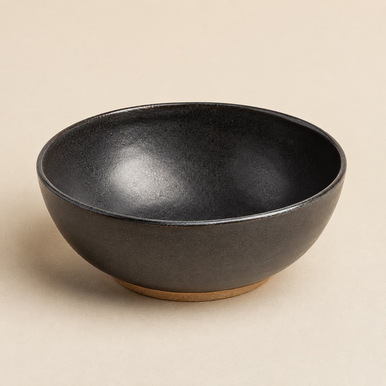 Replacement Soup Bowl Ø18 — charcoal glazed stoneware with an unglazed clay foot ring.