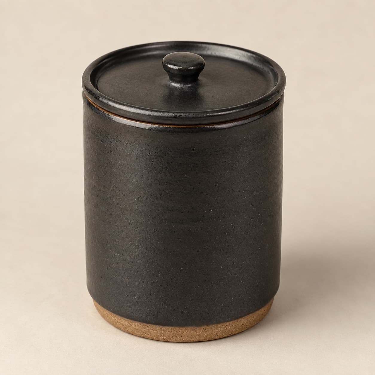 Storage Jar 1 L with Lid — charcoal glazed stoneware with an unglazed clay foot ring.